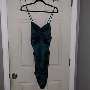 Cute turquoise satin dress.